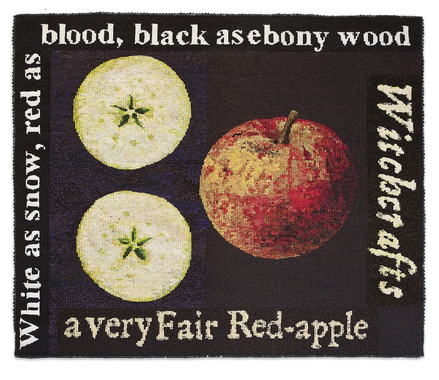 Tapestry of red apple and two apple slices on black background surrounded by words