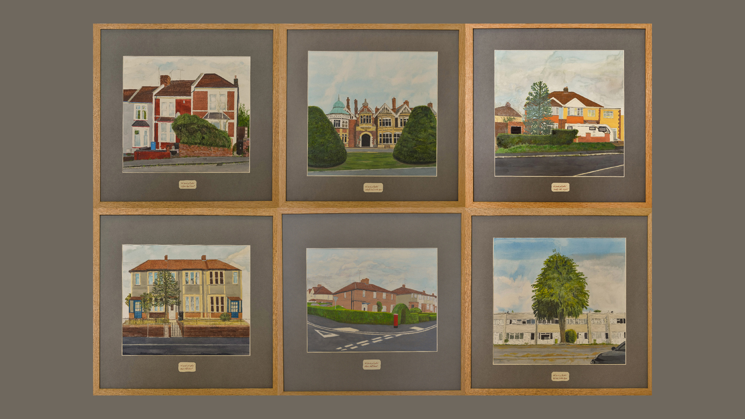 Six paintings of gardens hanging in two rows of three on a grey wall