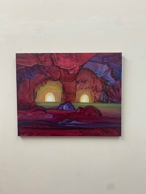 A painting of a magical cave with two lit entranceways