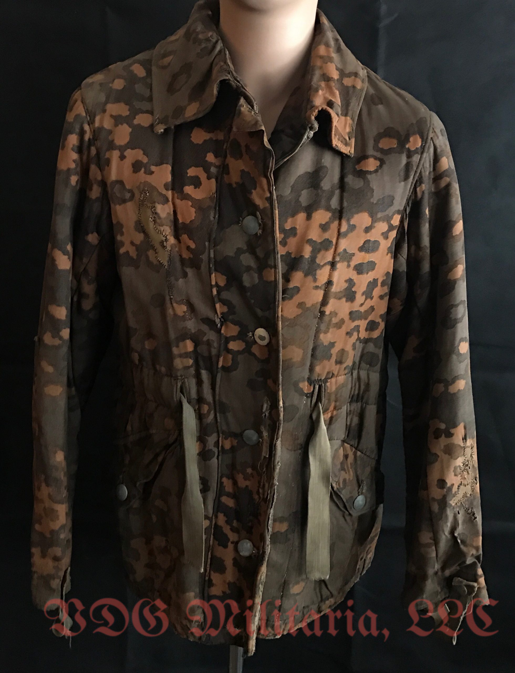 WW2 German Waffen-SS Fall Reversible Parka with modified collar and Combat Repairs