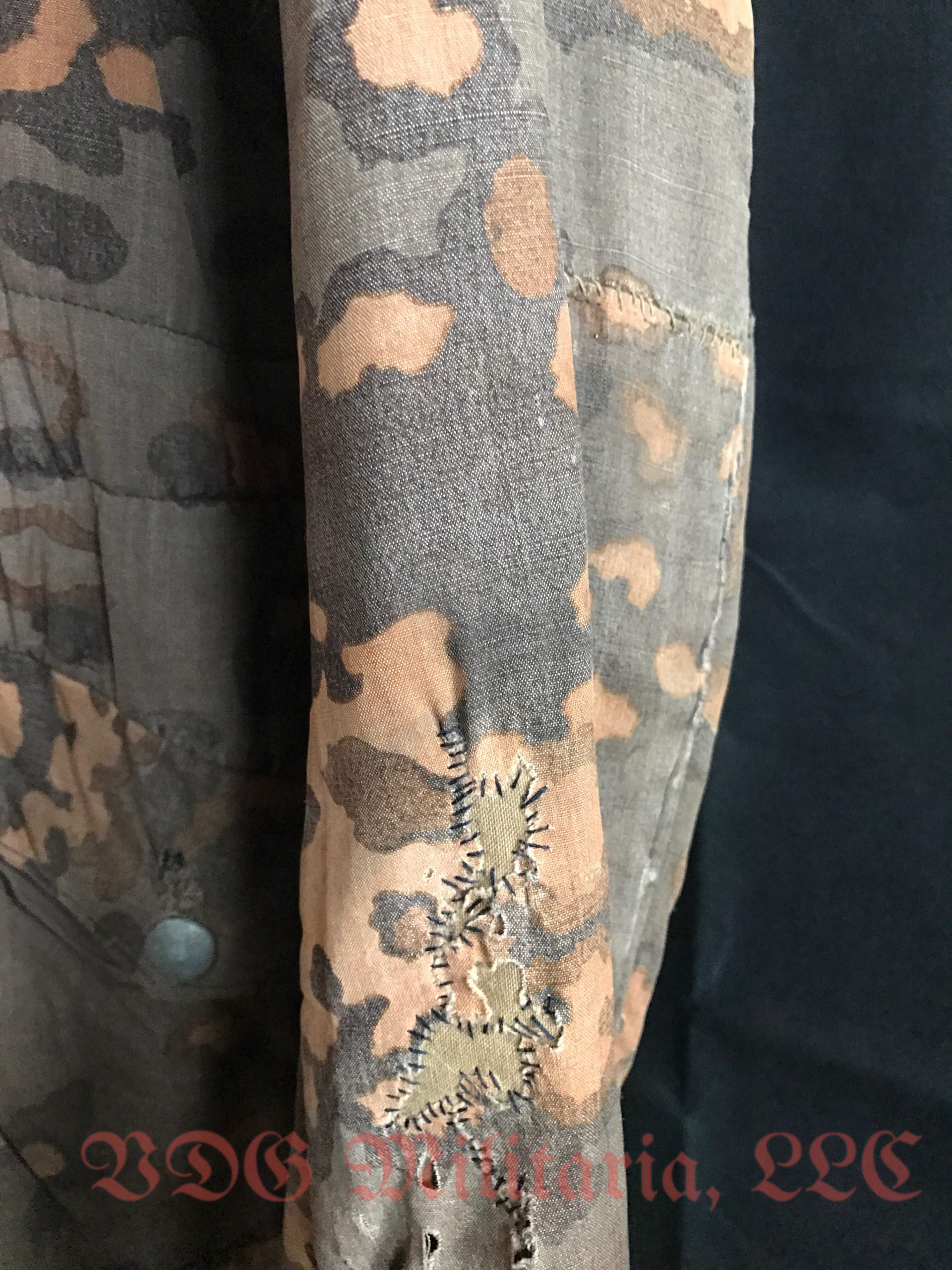 WW2 German Waffen-SS Fall Reversible Parka with modified collar and Combat Repairs - Image 4
