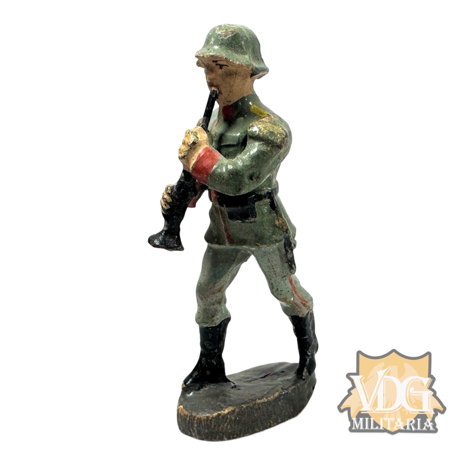 WW2/1930's Era German Composition Toy Heer Soldier Marching with Clarienet-Maker marked "Elastolin Germany"
