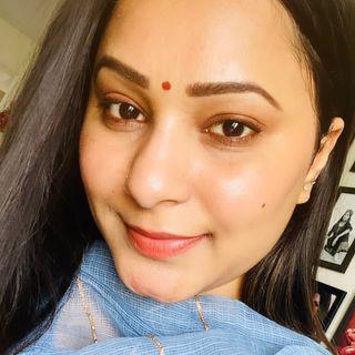 Nidhi K