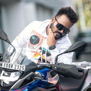 Hussain S K