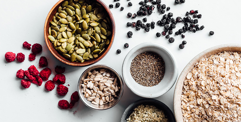 Muesli ingredients in separate bowls