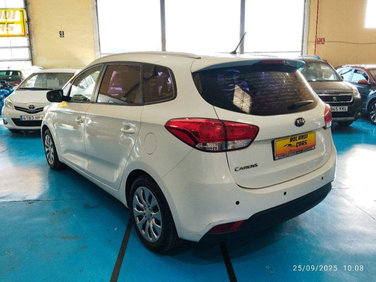 Kia Carens - 4