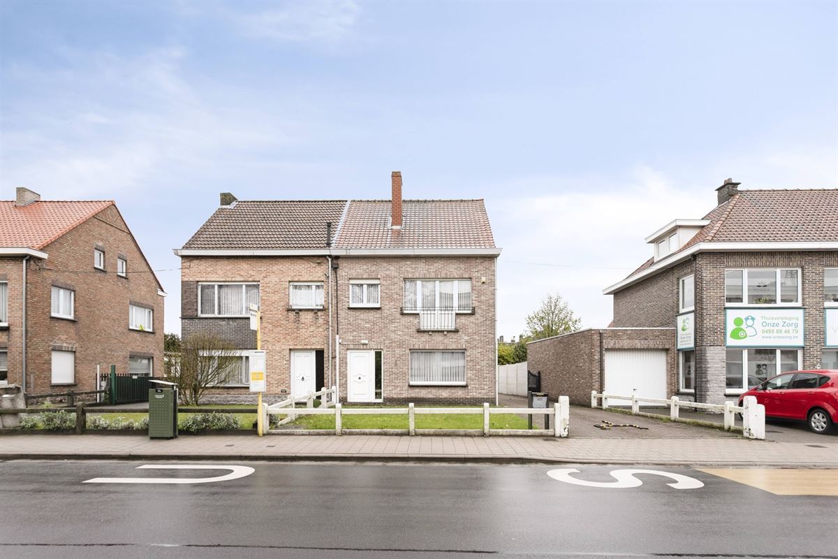 Halfopen woning met 3-4 slpk, zonnige veranda, terras en tuinberging nabij het centrum van Gent
