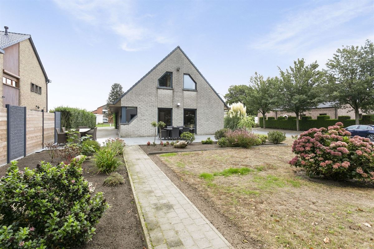 Gezellige woning met 3 slpk, dubbele garage en tuin in rustige buurt van Evergem-Centrum