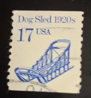 United States 1986 17 cents Dog Sled 17c Transportation stamp, photographed by a collector