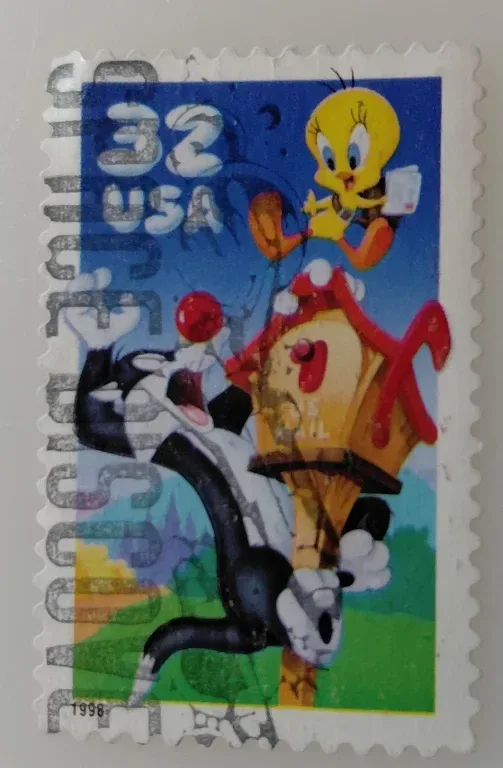 United States 1998 32 cents Sylvester and Tweety 32c stamp, photographed by a collector