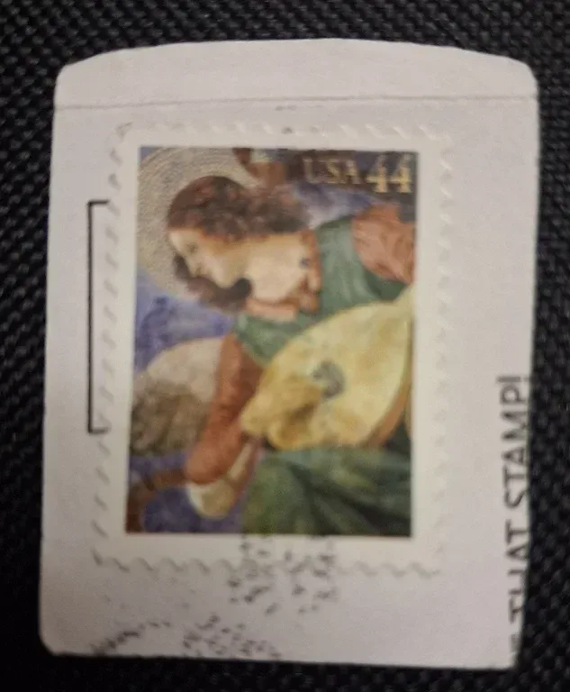 United States 2010 44 cents Angel with Lute 44c Christmas stamp, photographed by a collector