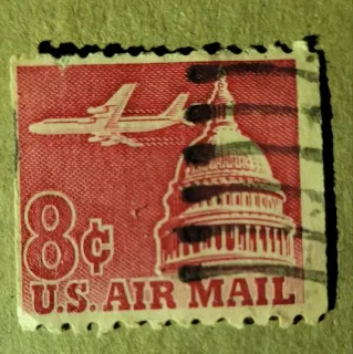 United States 1963 8 cents The Sn with all over tagged cancelled stamp, photographed by a collector