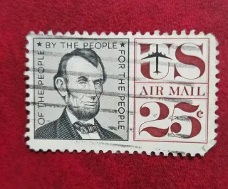 United States 1960 25c Abraham Lincoln Airmail stamp, photographed by a collector