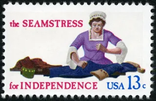 United States 1977 13c Skilled Hands For Independence Seamstress U.S stamp, photographed by a collector