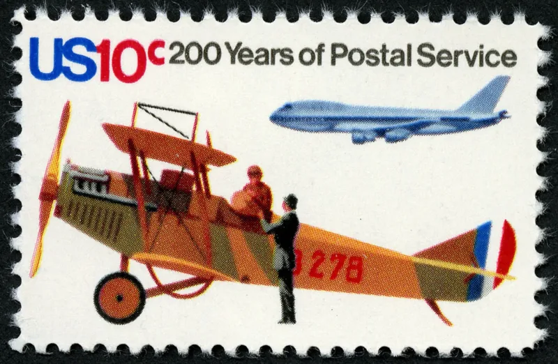 United States 1975 10c U.S. Postal Service Bicentennial Early Mail Plane and Jet stamp, photographed by a collector