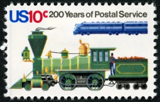 United States 1975 10c U.S. Postal Service Bicentennial Old and New Locomotive stamp, photographed by a collector