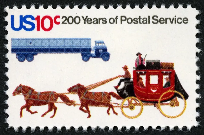 United States 1975 10c U.S. Postal Service Bicentennial Stagecoach and Trailer Truck stamp, photographed by a collector