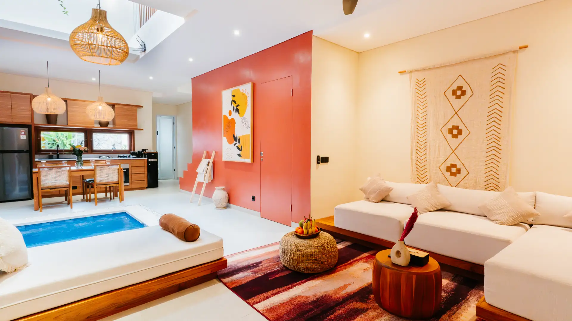 Enclosed living room with sofa, smart TV, and ceiling fan – Casa Sonya