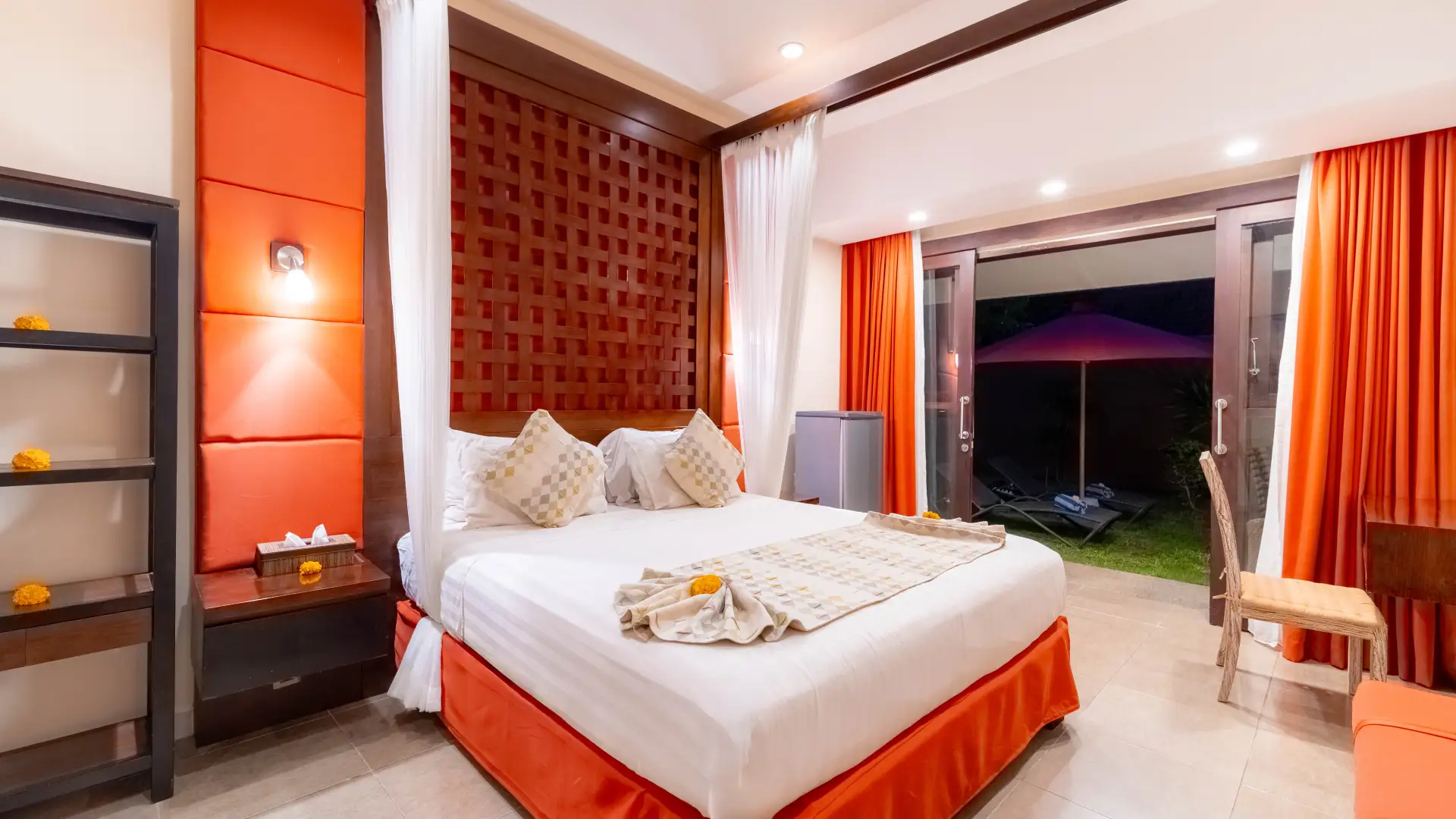 Modern bedroom interior with tropical decor at Nauli Villa Sanur