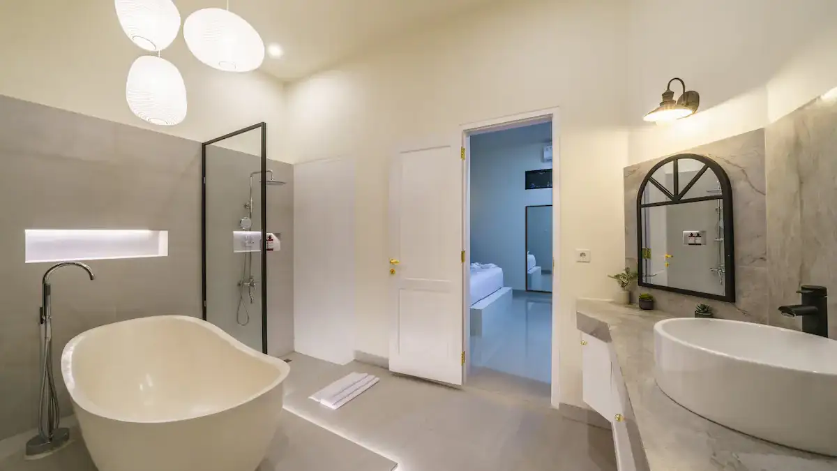 Luxurious bathtub facing garden in ensuite bathroom - Villa Selina Canggu