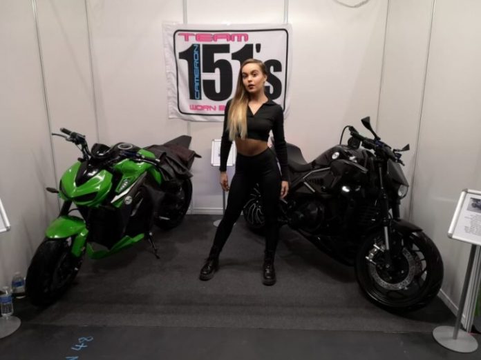 Promotional Model With Macrais At London Motorcycle Show 2022