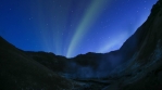 Aurora sunset over geothermal volcanic mountain valley Krysuvik Iceland