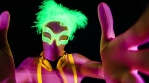 fantastic video of sexy cyber raver dancer babe filmed in fluorescent clothing under UV black light