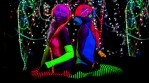 fantastic video of sexy cyber raver dancer babe filmed in fluorescent clothing under UV black light