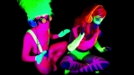 fantastic video of sexy cyber raver dancer babe filmed in fluorescent clothing under UV black light