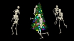 The skeletons are dancing with the Christmas tree. Christmas skeletons dance.