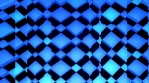 Blue rotating cubes behind refractive panels