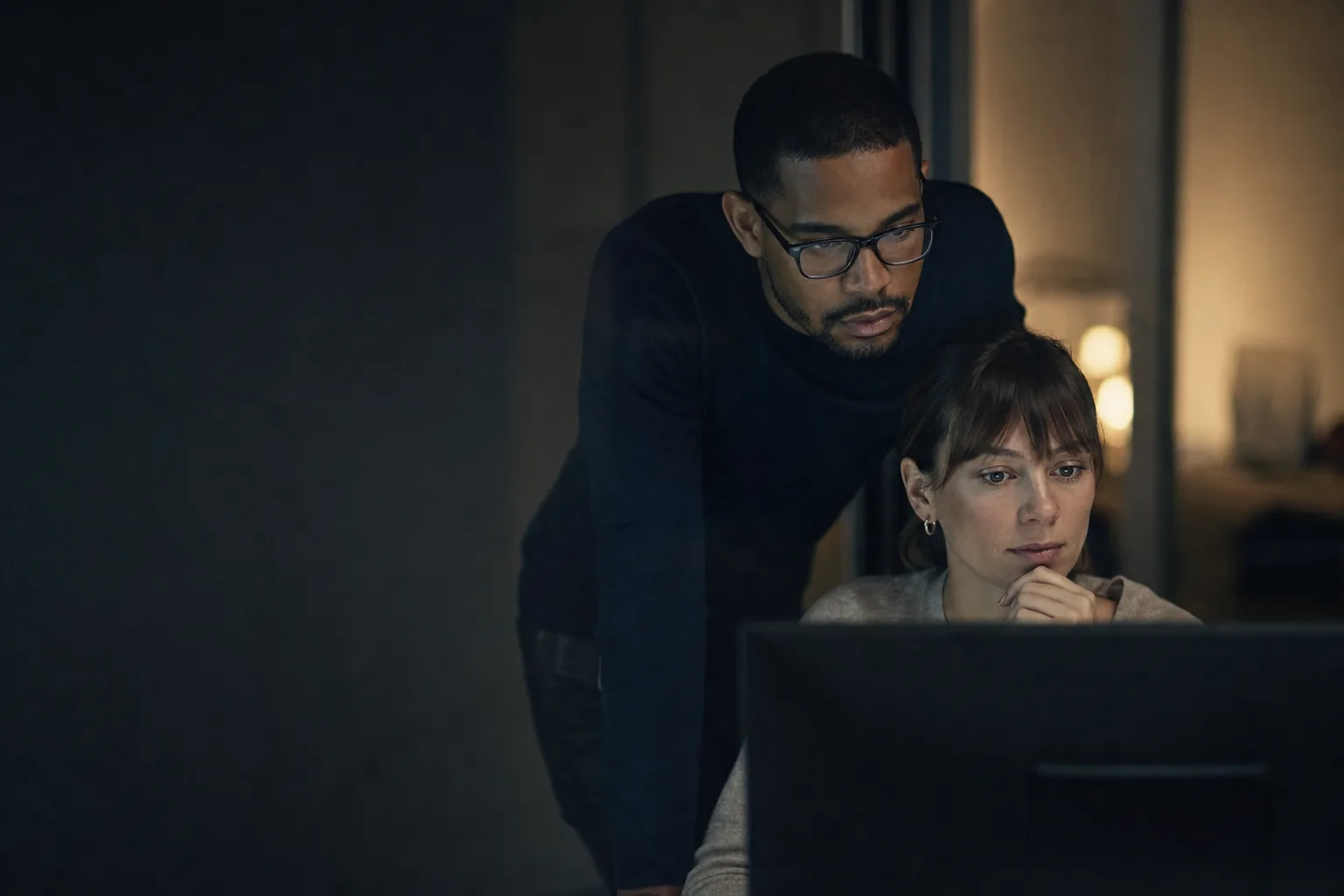 Editorial photograph: an operator reviewing machine output on screen, accompanying AI Customer Support Integration for Enterprise Teams.