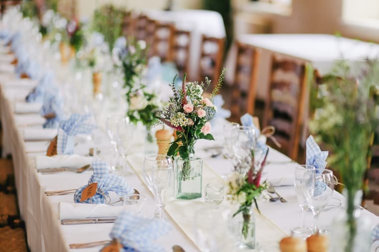 The long table, laid for dinner