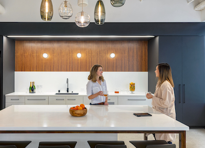 People chatting in kitchen