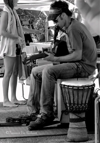 Juzzy Smith performing as a one man band at Lennox Heads market