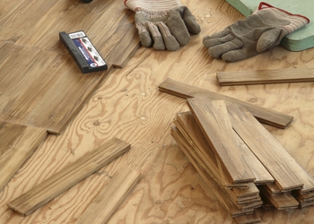 bigstock-Laying-Wood-Flooring-4037006.jpg