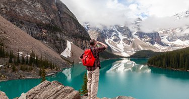 bigstock-Hiking-man-with-red-rucksack-b-432959024.jpeg