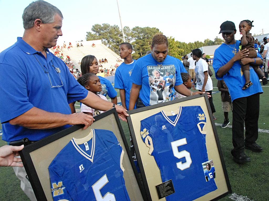 Narjaketha Bennett, Rajaan's mother, was presented with his retired No. 5 jersey on Sept. 3, 2010.