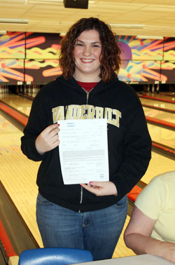 Signing_250x378.jpg