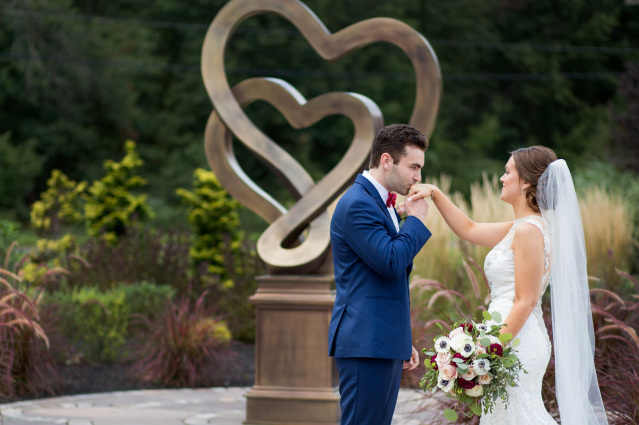 Gorgeous outdoor grounds with floral archway