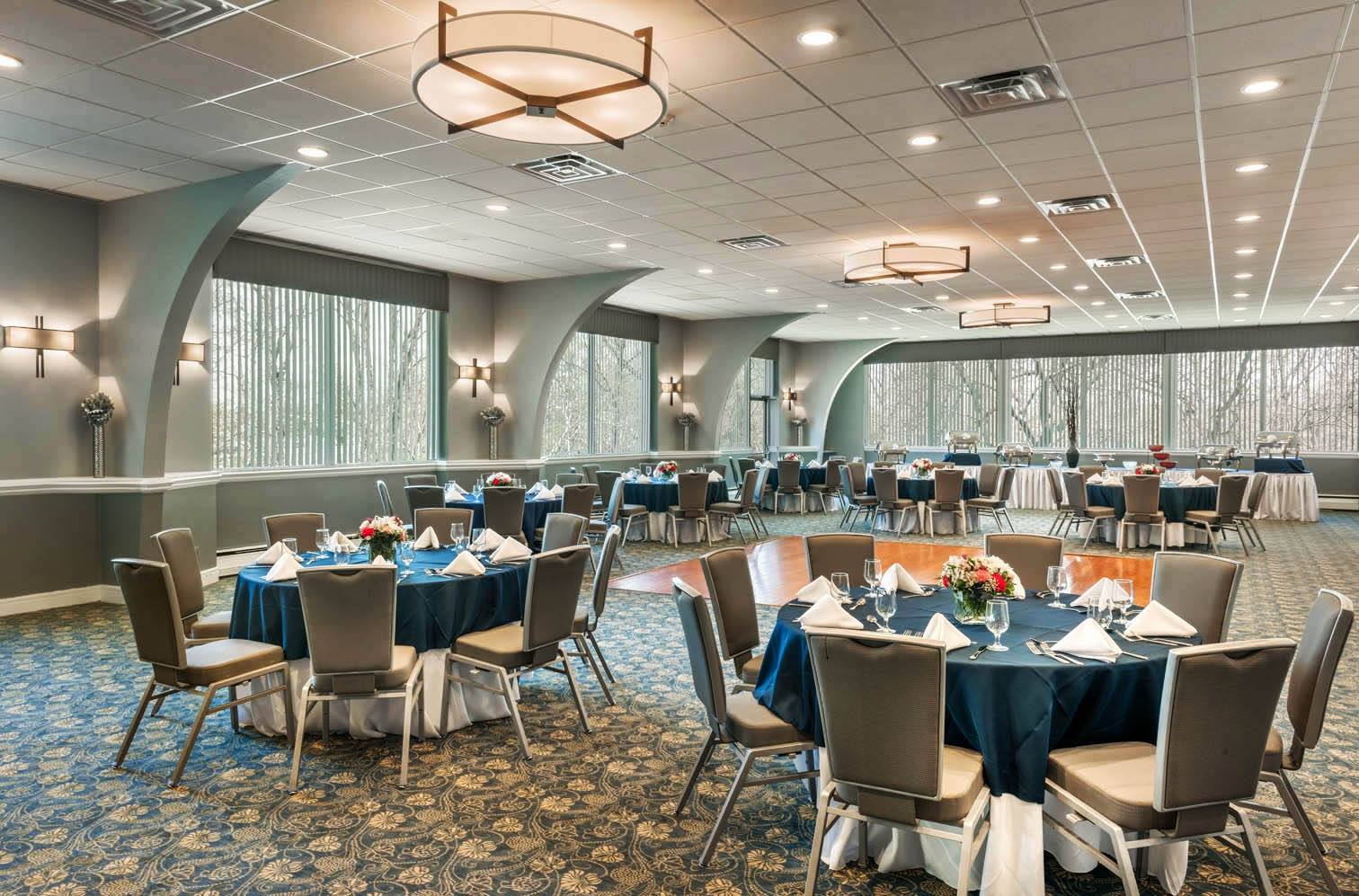 The Kenilworth Hotel event space with round tables and dance floor