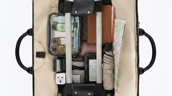 Packed bag interior with organized compartments