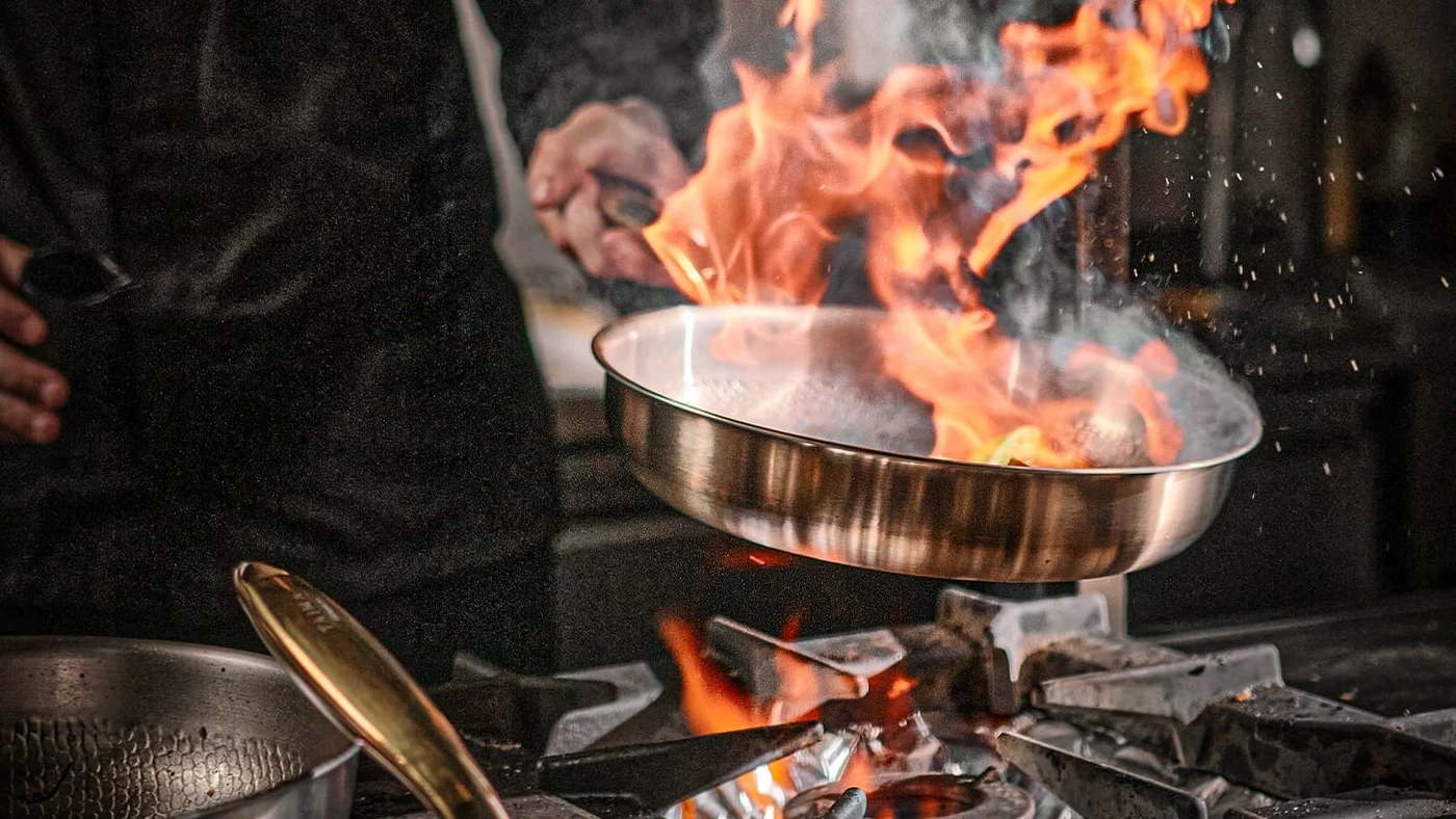 The Taima pan searing over a high flame