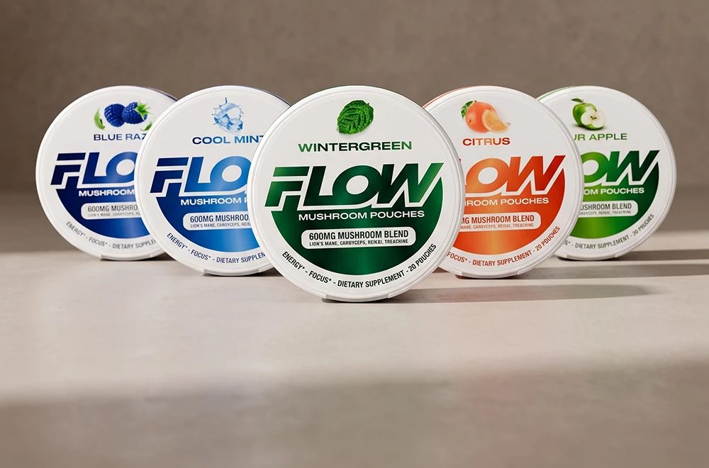 Five Flow mushroom pouch cans in Blue Razz, Cool Mint, Wintergreen, Citrus and Sour Apple