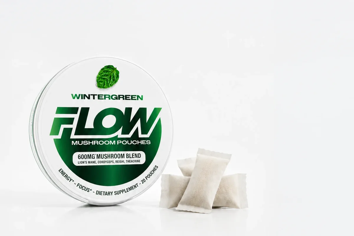 A Flow Wintergreen can with pouches beside it