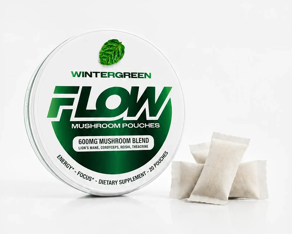 A can of Wintergreen Flow next to a few loose pouches