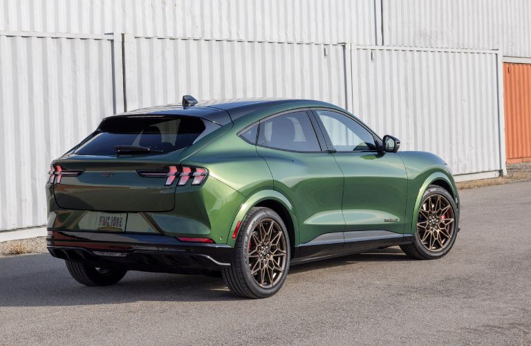 Green 2024 Ford Mustang Mach-E GT with Bronze Appearance Package Rear Exterior by Shipping Containers