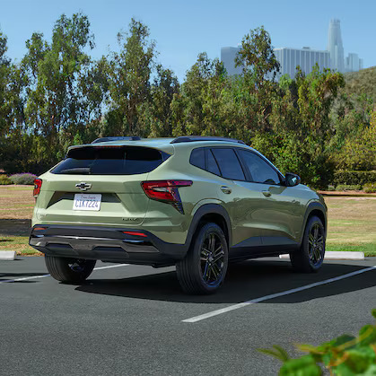 A green2025 Chevrolet Trax parked.