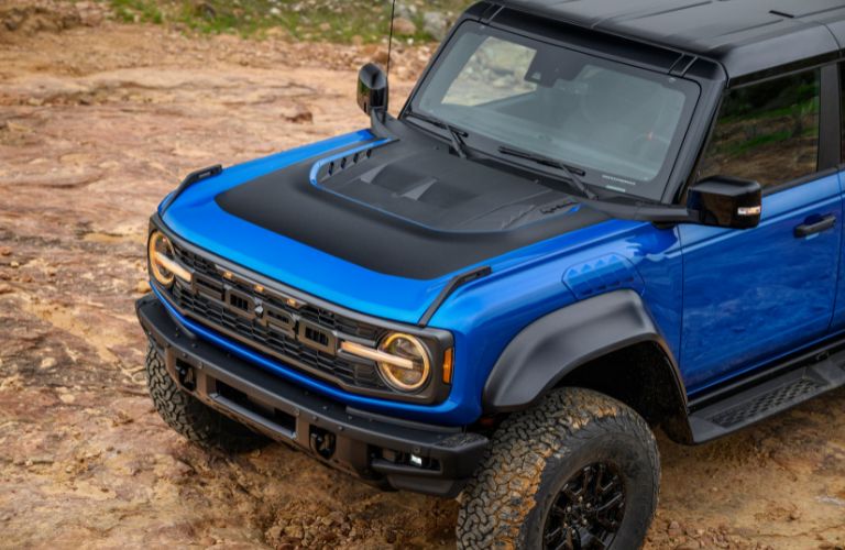 Blue 2024 Ford Bronco Raptor with Black Appearance Package Hood, Bumper, Roof and More