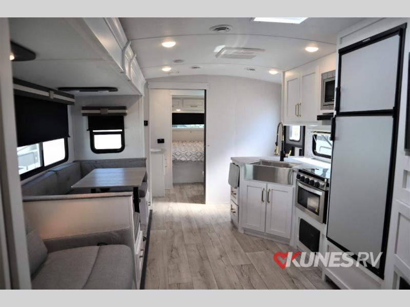 Dutchmen RV Astoria 2903BH kitchen features stainless steel appliances to make them easy to clean